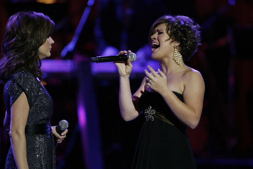 Martina McBride and Kelly Clarkson duet during CMT Giants Honoring Reba McEntire