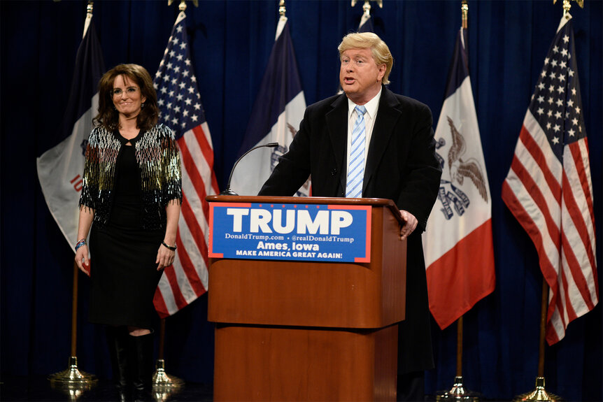 Darrell Hammond stands at a podium as Donald Trump on SNL