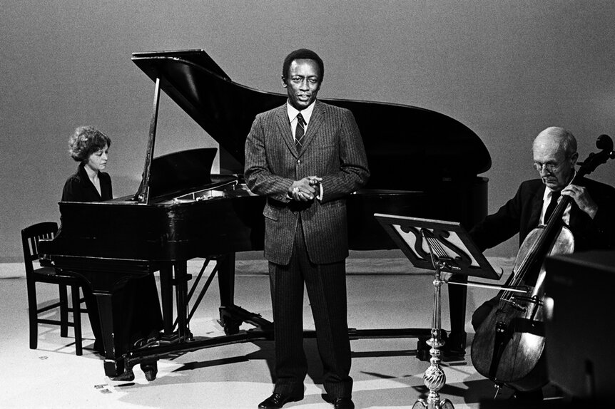 Composer Garrett Morris on Saturday Night Live singing in front of a piano