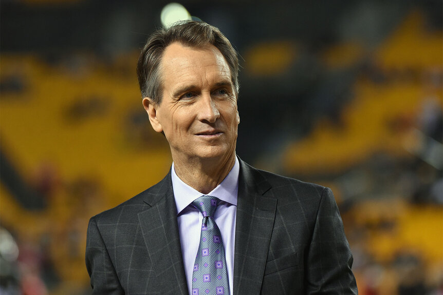 Cris Collinsworth, NBC Sports Sunday Night Football announcer, looks on from the sideline before a game between the Kansas City Chiefs and Pittsburgh Steelers