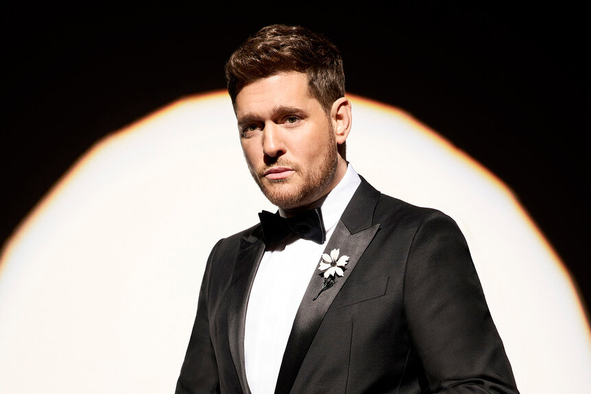 Michael Buble wears a black tuexdo for Season 26 of The Voice