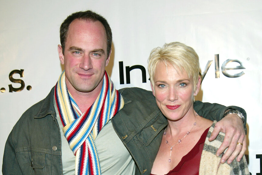 Christopher Meloni has his arm over Sherman Williams' shoulder on the red carpet