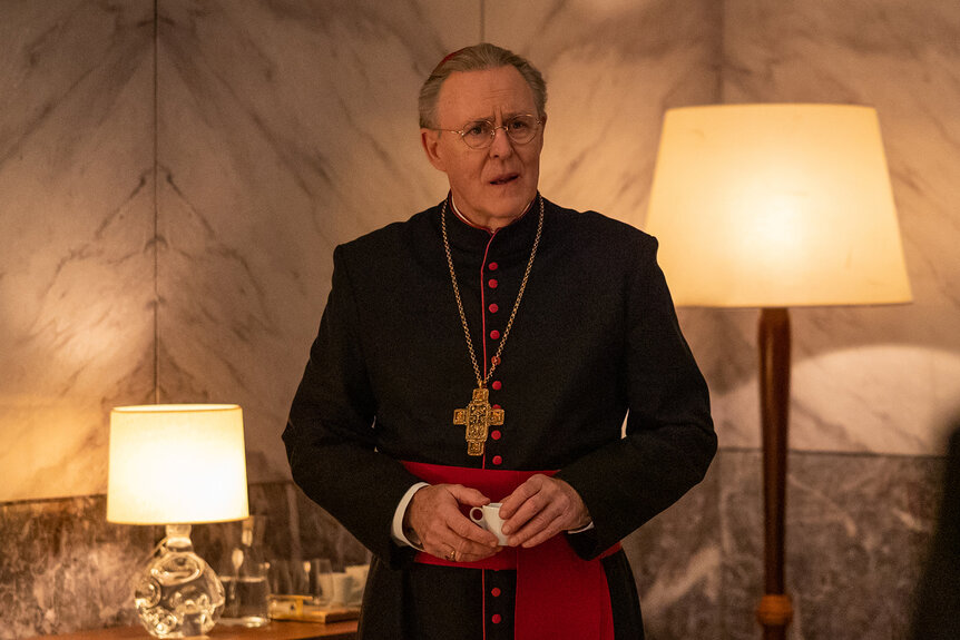 Cardinal Tremblay (John Lithgow) wears a cross in Conclave