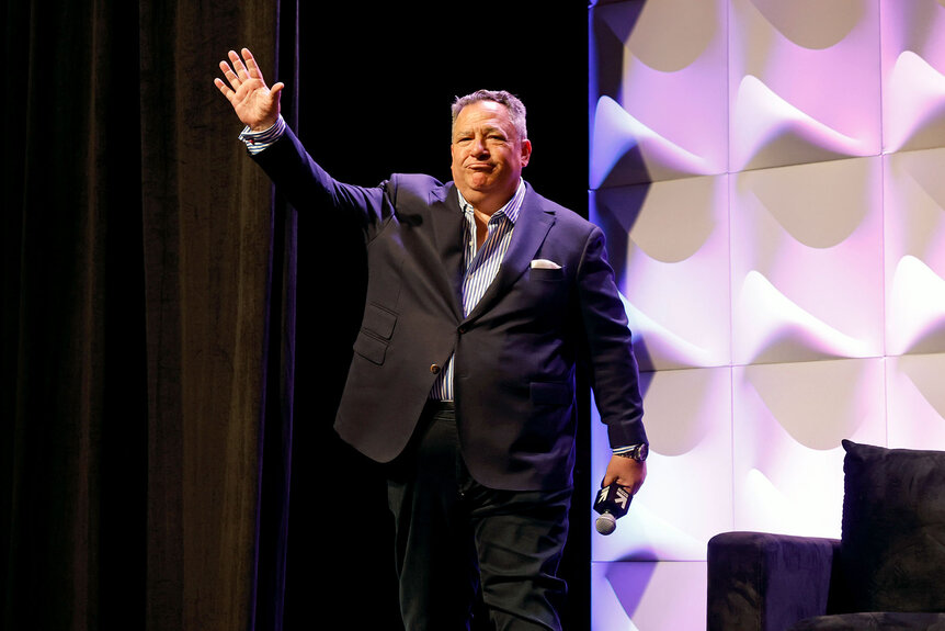 Josh Mankiewicz walks onstage at the Featured Session: "Dateline 24/7: How the True Crime Powerhouse Became a Podcast Empire" at SXSW