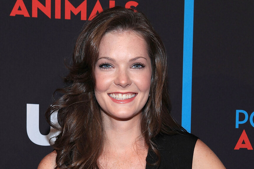 Meghann Fahy smiles on the red carpet circa 2012