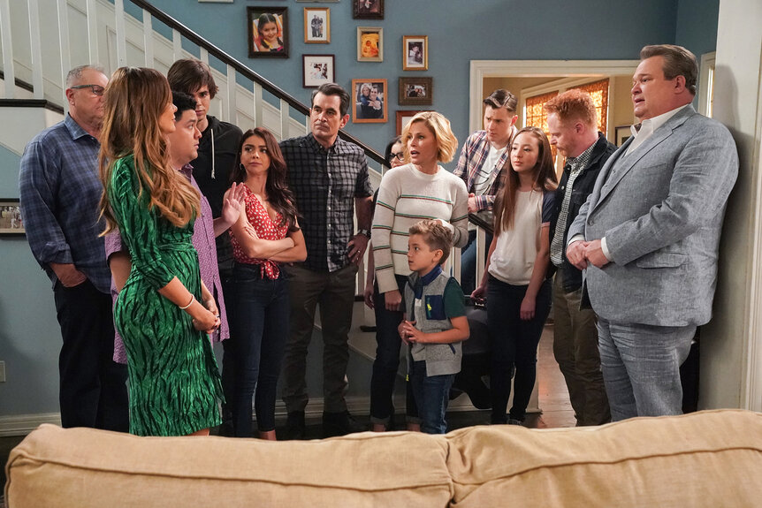 The entire cast of modern family are in a living room on Season 11 Episode 17/18.