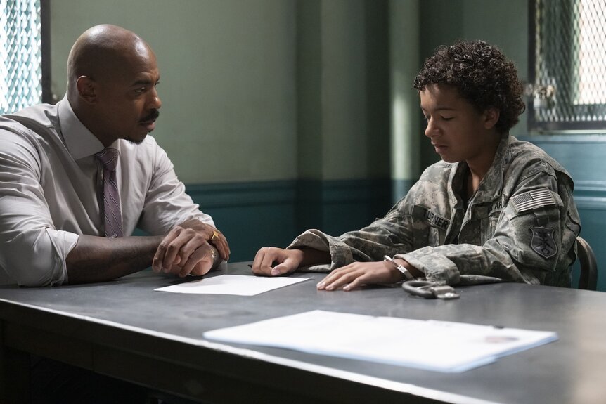 Det. Jalen Shaw (Mehcad Brooks) soeaks to Anthony Turner (Colton Osorio) in Law & Order Episode 24005.