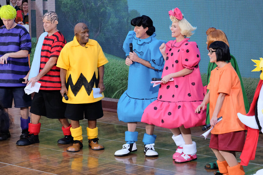 Willie Geist, Carson Daly, Al Roker, Matt Lauer, Savannah Guthrie, Tamron Hall, and Natalie Morales dress up as Peanuts characters