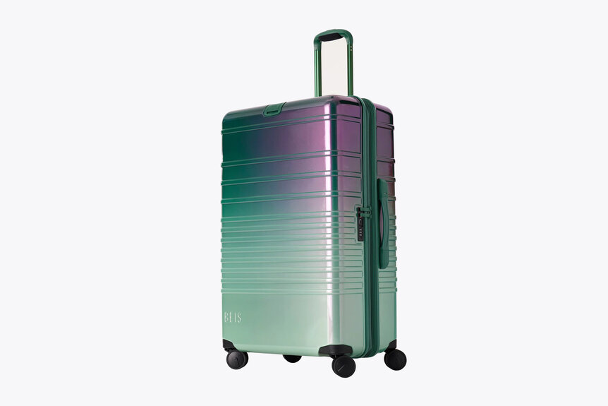 A green and purple suitcase for Wicked by BÉIS