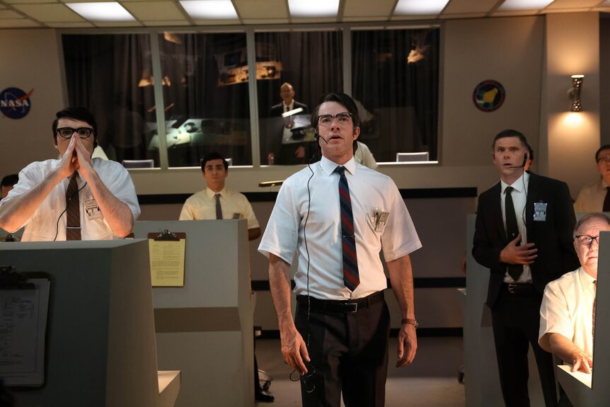 John Mulaney, Mikey Day and Micheal Longfellow dressed as NASA officials in the 1960s.