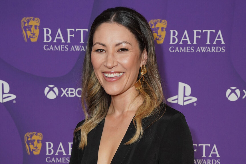 Eleanor Matsuura wears a black dress on the red carpet