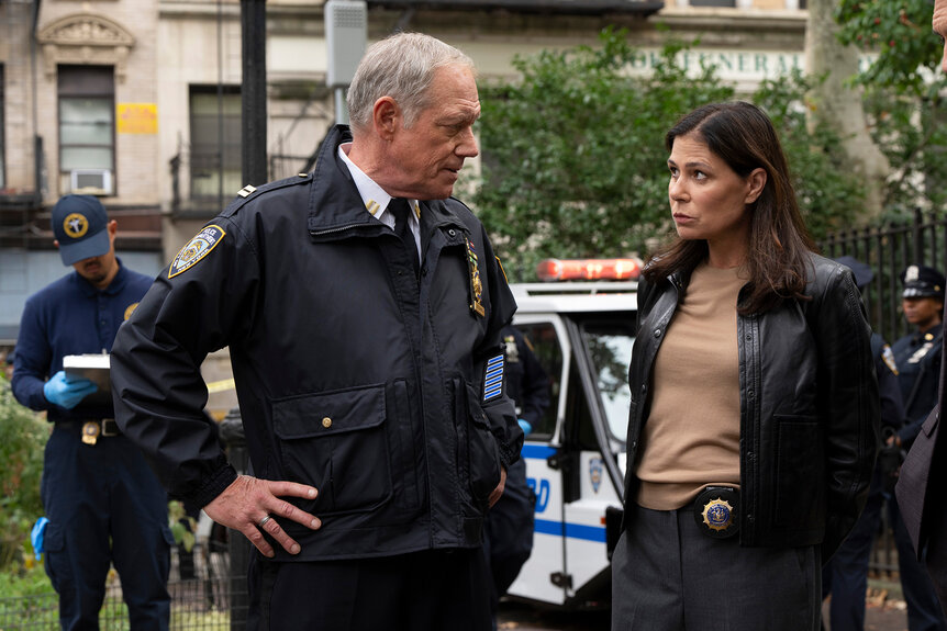 Captain Greg Stockwell and Lt. Jessica Brady talk to each other on Law & Order Season 24 Episode 8.