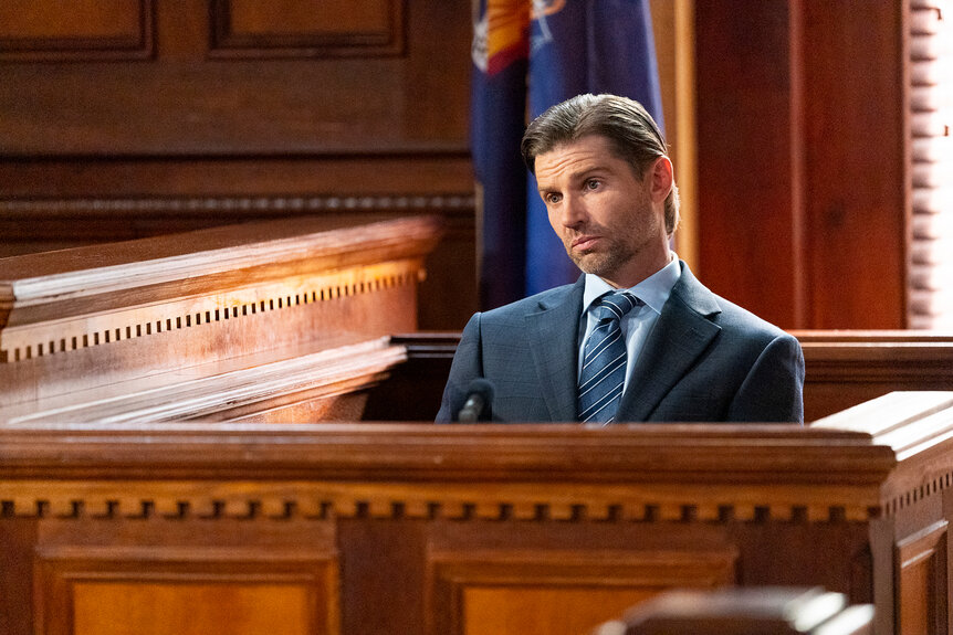 Lt. Miles Brandt sits in the witness stand in court on Law & Order Season 24 Episode 8.