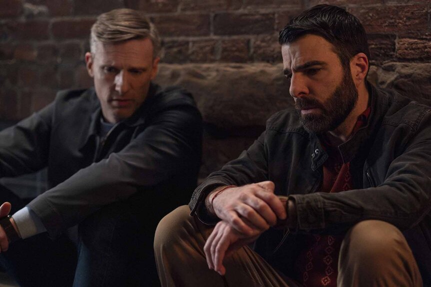 Dr. Josh Nicols (Teddy Sears) and Dr. Oliver Wolf (Zachary Quinto) talk in Brilliant Minds Episode 107.