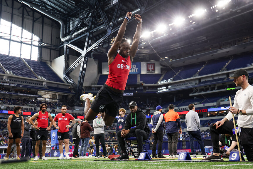 Joe Milton a quarterback from Tennessee participates in the long jump at the NFL Combine