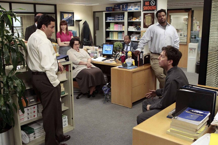 The cast of The Office chat with each other in the office on Episode 824.