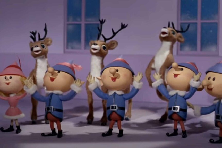 Elves and reindeer cheer together in Rudolph the Red-Nosed Reindeer (1964).