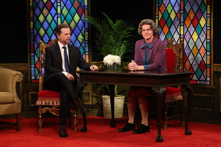 David Spade and Dana Carvey sit in a church on Saturday Night Live Season 50 Episode 8