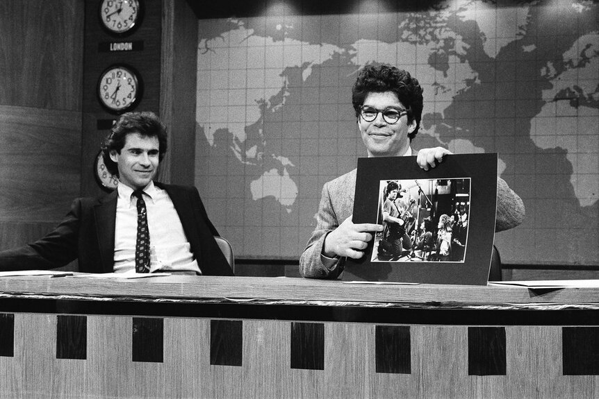 Dennis Miller and Al Franken during the weekend update on Saturday Night Live Season 11