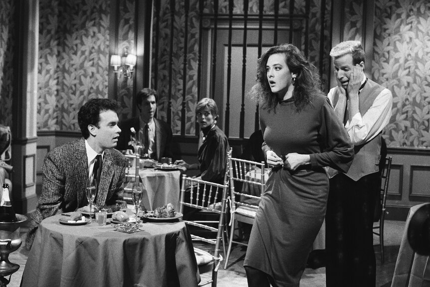 Tom Hanks, Joan Cusack and Terry Sweeney during a sketch on Saturday Night Live Season 11