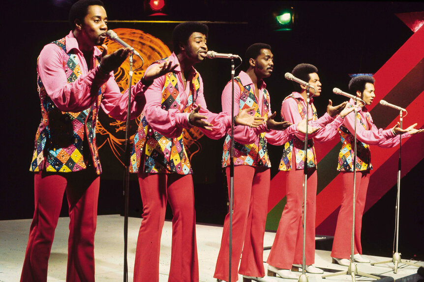 The Temptations performing on stage