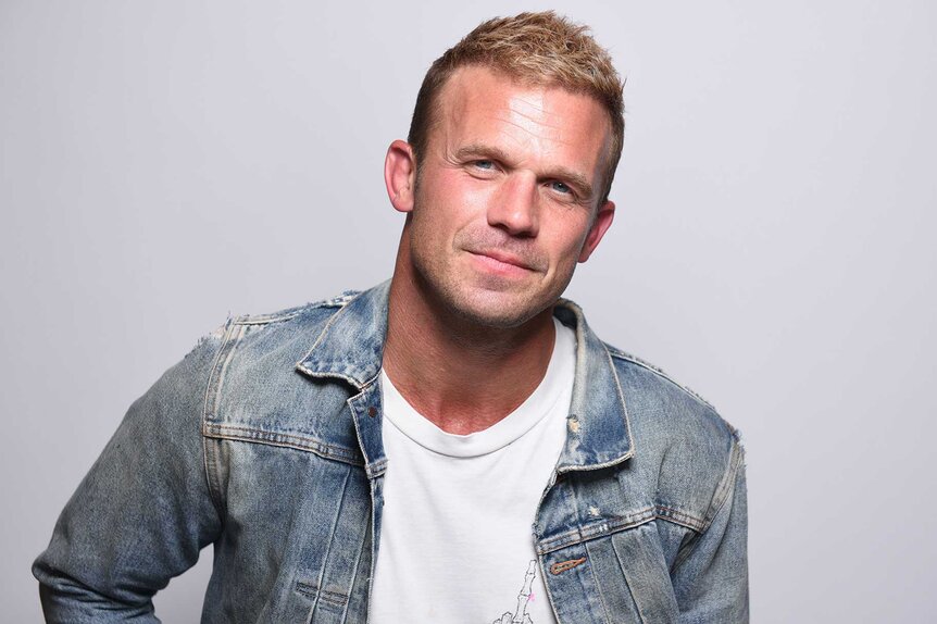 Cam Gigandet smiling and posing at the IMDboat Exclusive Portrait Studio.