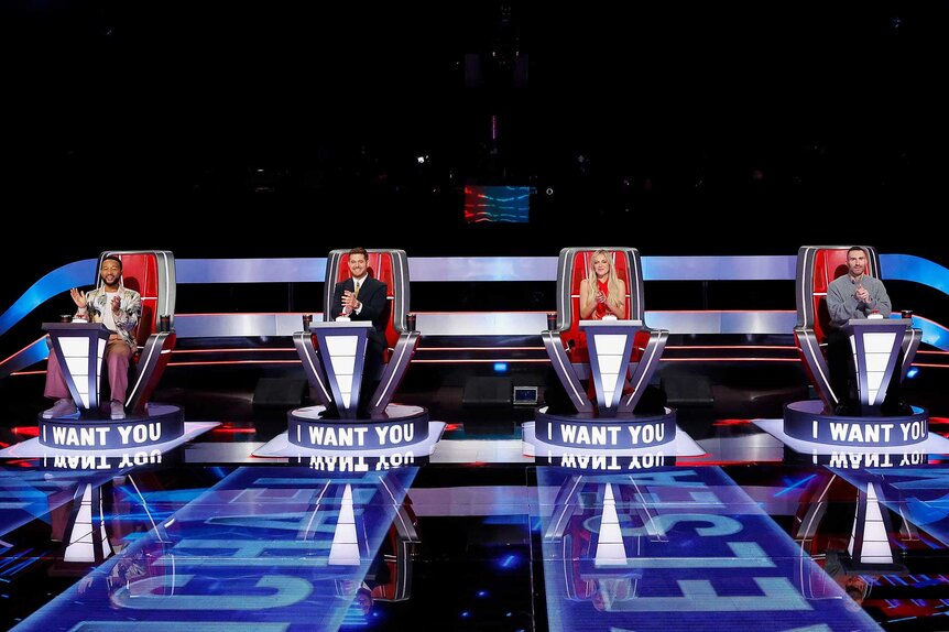 John Legend, Michael Bublé, Kelsea Ballerini, and Adam Levine in the coaches chairs on The Voice Season 27, Episode 1.