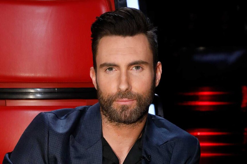 Adam Levine wears a blue blazer on The Voice Season 13, Episode 21A.