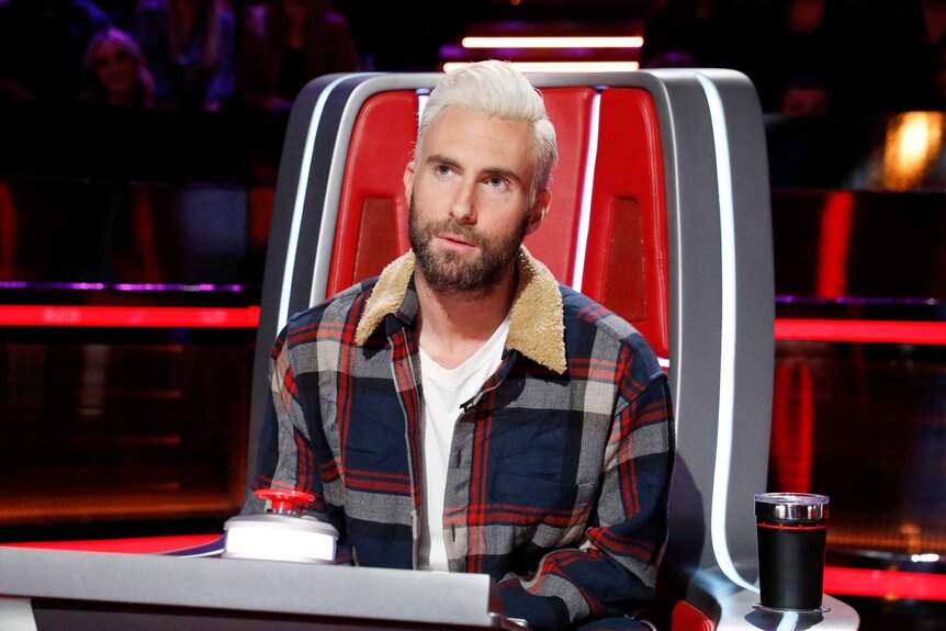 Adam Levine wears a plaid jacket on The Voice Season 14