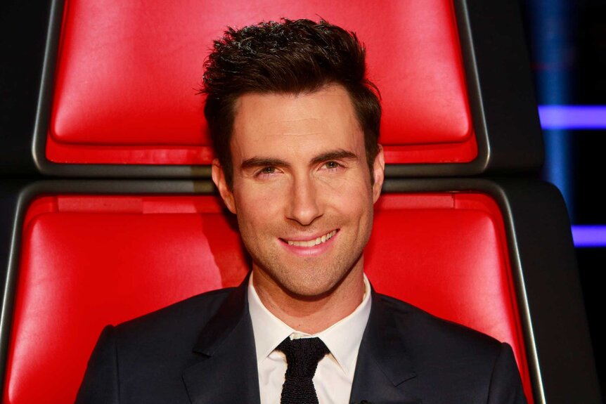 Adam Levine wears a suit in her coaches chair on The Voice Season 3 Episode 22