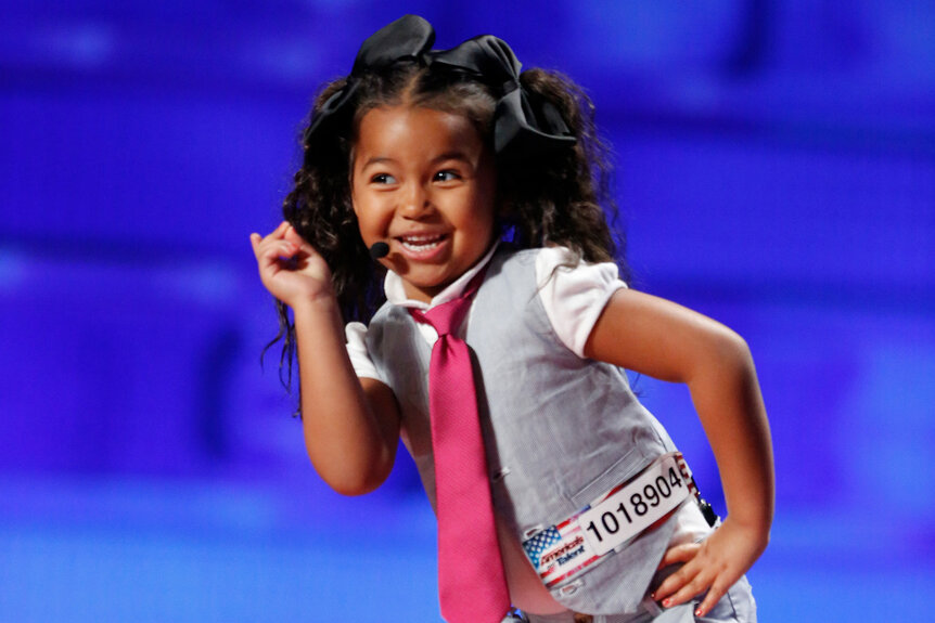 Heavenly Joy sings on stage on America's Got Talent Season 10.