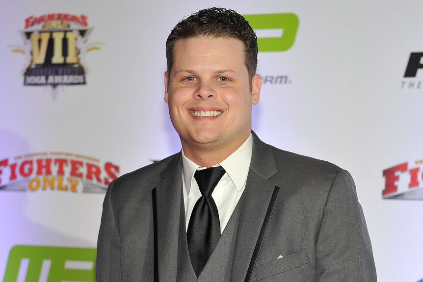 Derrick Levasseur smiles on the red carpet at the Fighters Only World Mixed Martial Arts Awards