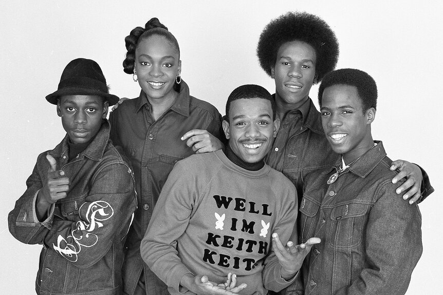 Members of the hip-hop group Funky 4 + 1 smile together.