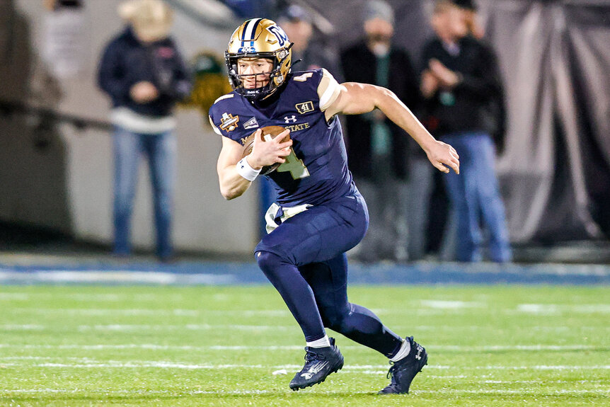 Montana State Bobcats quarterback Tommy Mellott (4) runs with the ball during a game