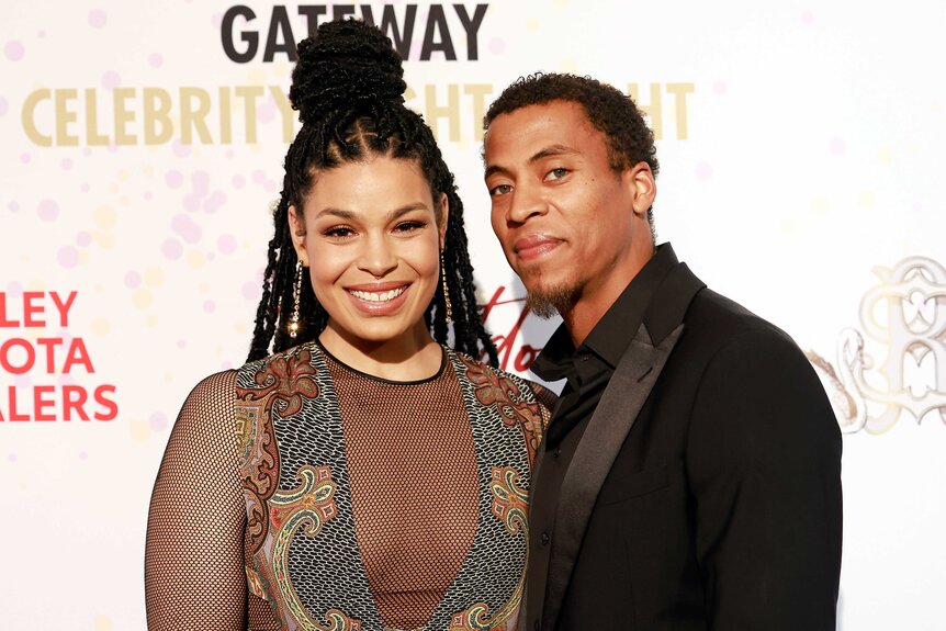 Jordin Sparks smiling and posing with Dana Isaiah Thomas.