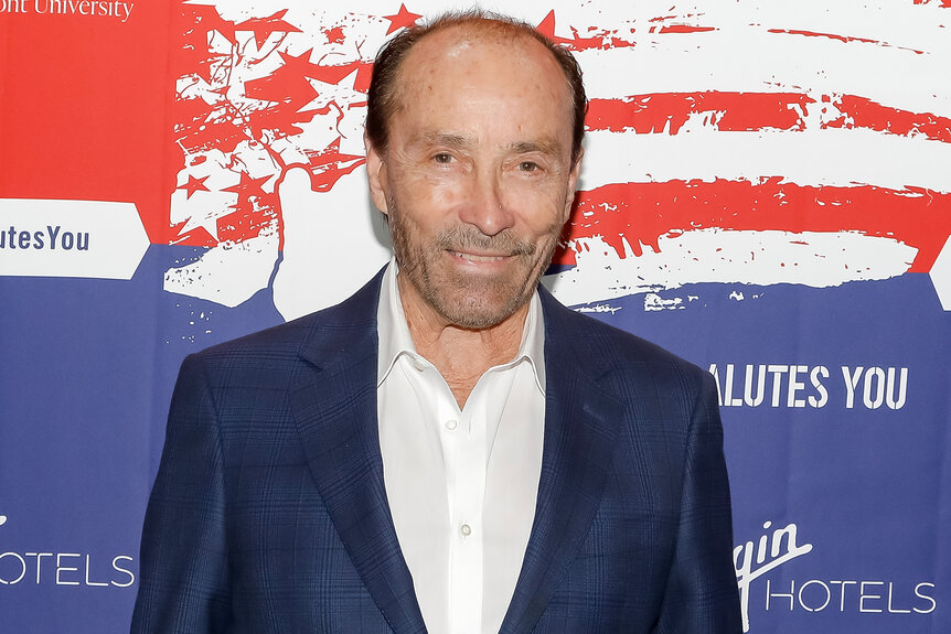 Lee Greenwood smiles on the red carpet for the 'America Salutes You' 2023 concert