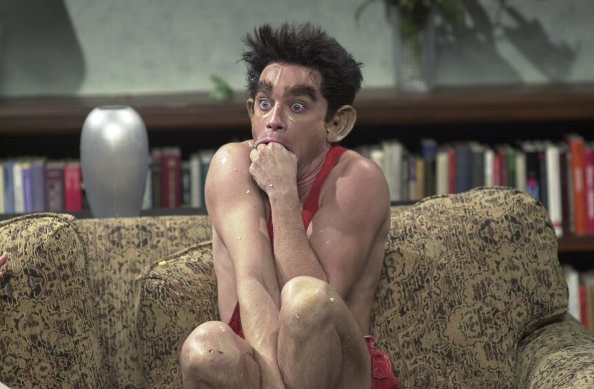 Mr. Peepers (Chris Kattan) sticks his finger in his mouth on SNL Episode 2604.