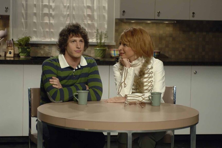 Whitney Houston (Maya Rudolph) sits and stares at Eric Butler (Andy Samberg) on SNL Episode 3201.