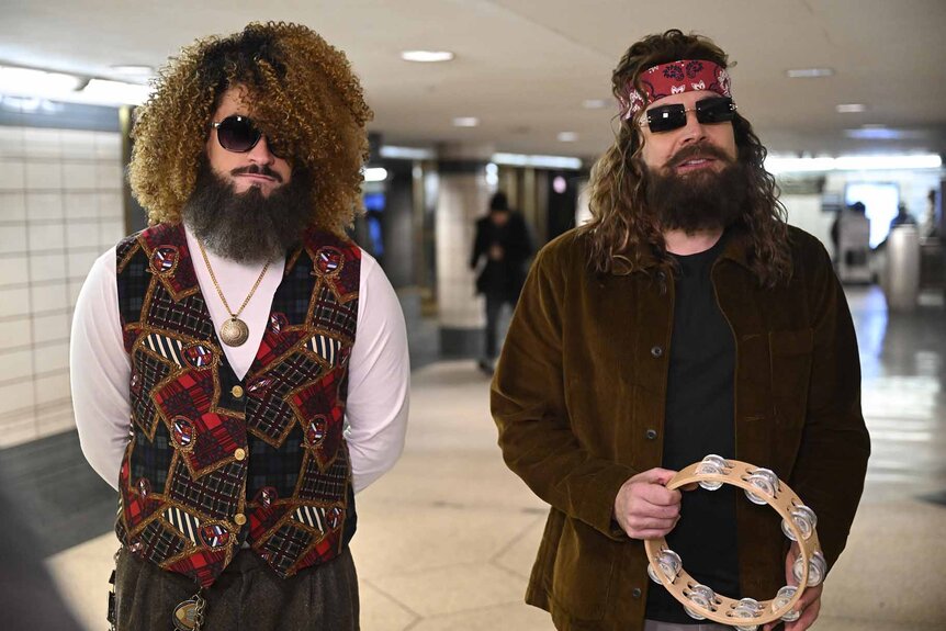 Bad Bunny and Jimmy Fallon appear in disguise for a surprise subway performance.