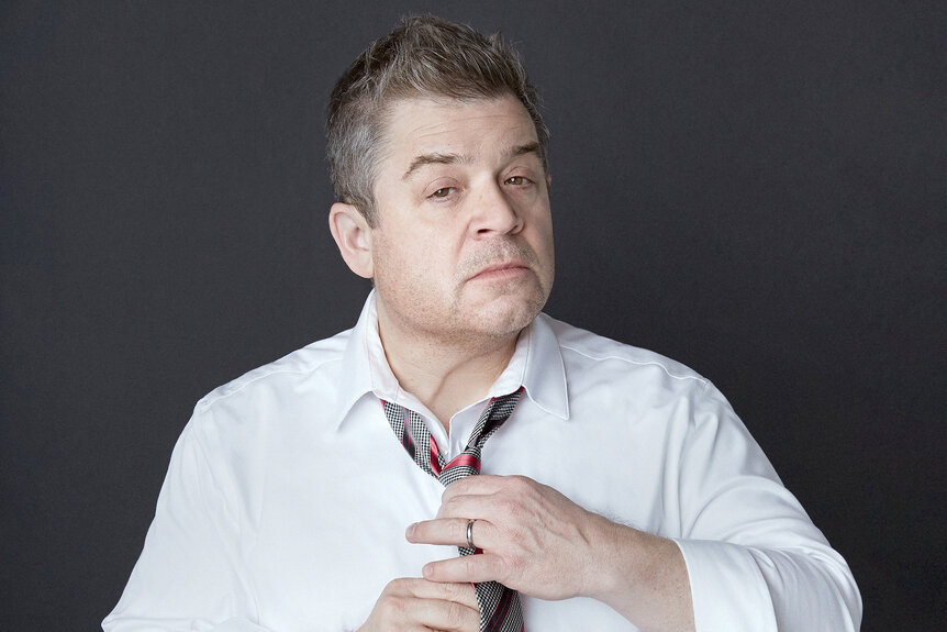 A headshot of Patton Oswalt