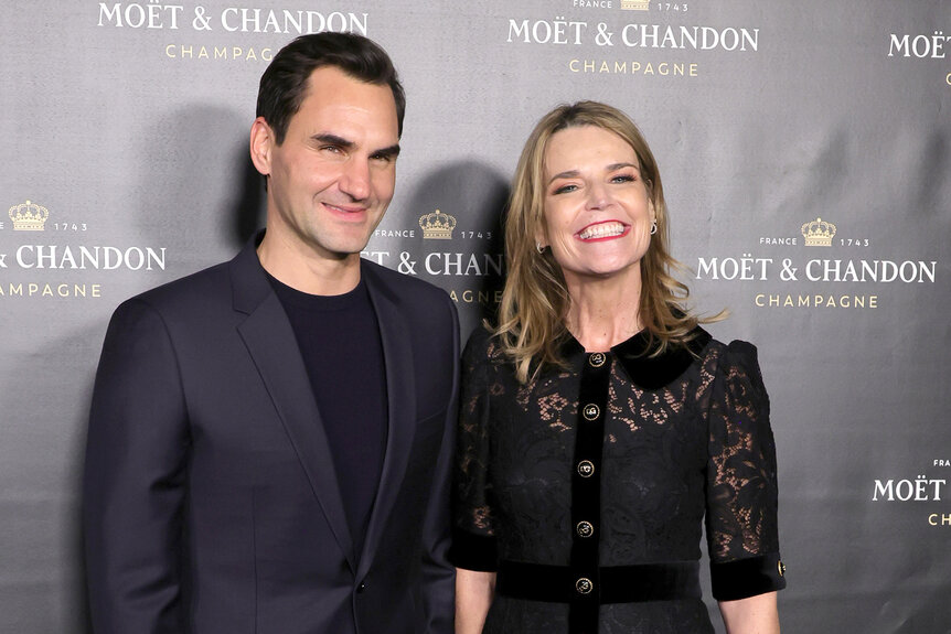 Roger Federer and Savannah Guthrie smile together on the red carpet