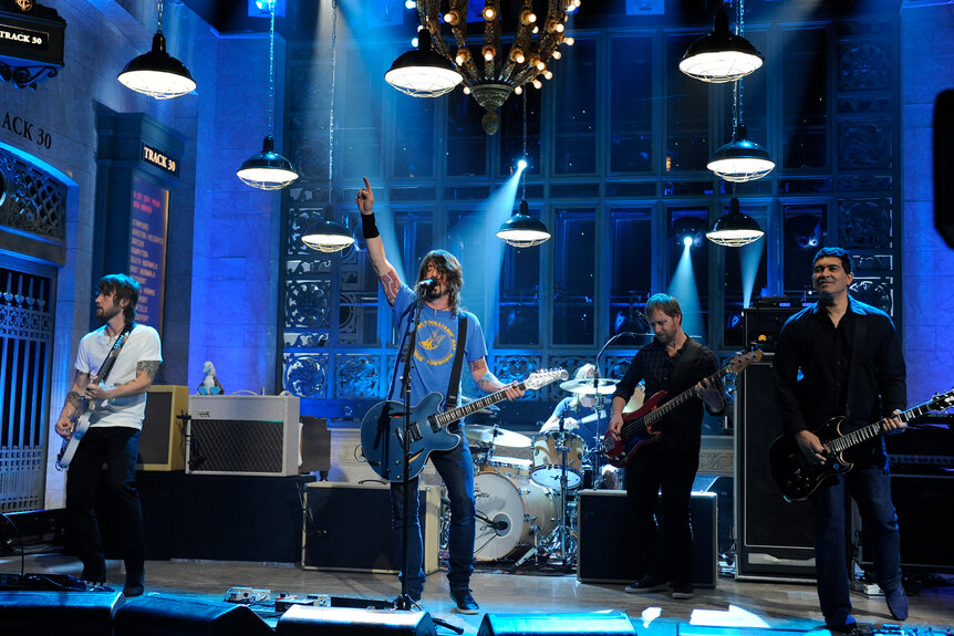 The Foo Fighters perform on stage during Saturday Night Live Season 36, Episode 19