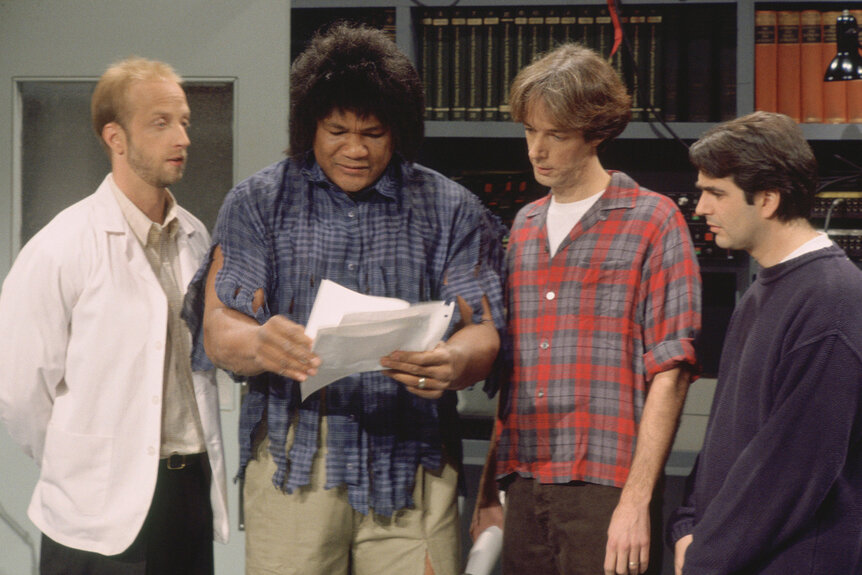 Chris Elliott, George Foreman and Fred Wolf during a sketch on Saturday Night Live Season 21