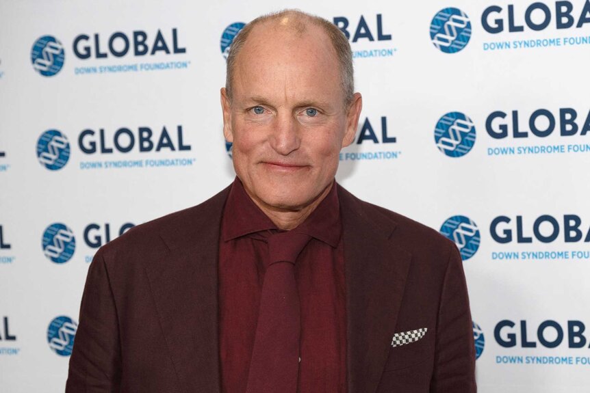 Woody Harrelson posing at the Global Down Syndrome Foundation's 16th Annual Be Beautiful Be Yourself Fashion Show.