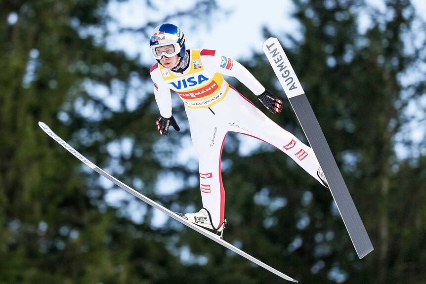 Daniel Tschofenig mid-air during the FIS Ski Jumping World Cup Individual Competition.