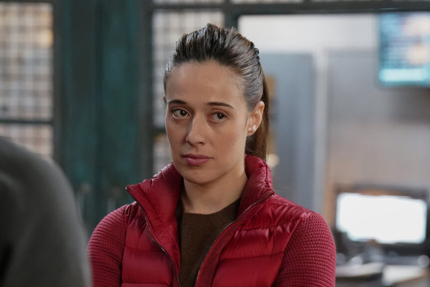 Kim Burgess looks upset in a red jacket on Chicago P.D Season 12 Episode 9