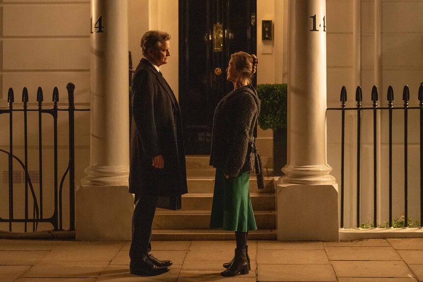 Mark Darcy (Colin Firth) and Bridget Jones (Renée Zellweger) stand outside facing each other in Bridget Jones: Mad About the Boy (2025).