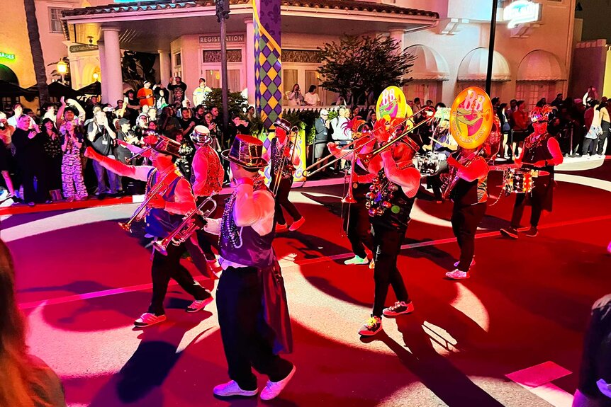 A marching band playing at Universal Orlando Resort's Mardi Gras Celebration.