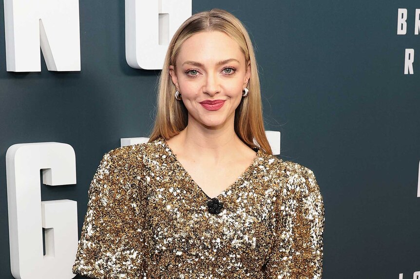 Amanda Seyfried smiling and posing at the New York premiere of Long Bright River.