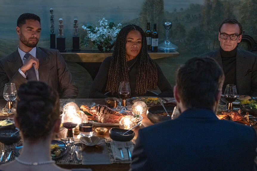 James Stokes, George Woodhouse and Dr. Zoe Vaugh sit at a dinner table in Black Bag